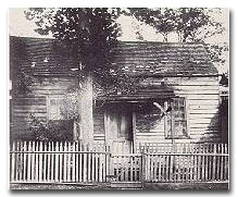 Sam Houston's first home in the new Republic was a shack near the present seat of county government. He later built a home on the west side of Travis between Prairie and Preston, fenced it and painted shrubberies.